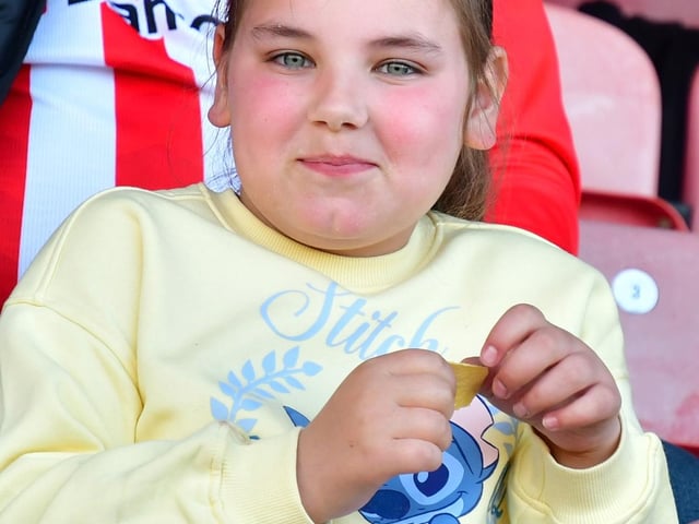 This young Derry City supporter is excited for kick-off at Celtic Park. Photo by Kevin Morrison.