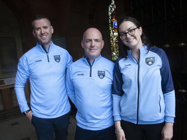 Foyle Cup organisers are all smiles at the Guildhall after the successful parade