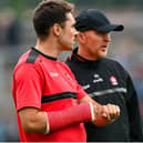 Derry manager Paddy Tally, right, and strength and conditioning coach Cairbre Ó Cairealláin in Páirc Esler on Saturday. Photo by Ramsey Cardy/Sportsfile