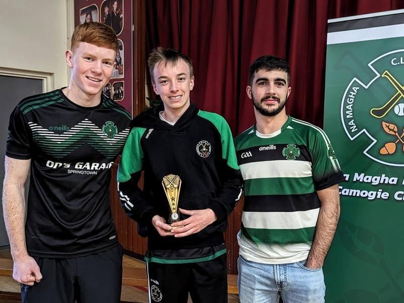 Daniel Doherty and Keelan Doherty presents U13 Leo O'Carolan with the Spirit of the Team award.