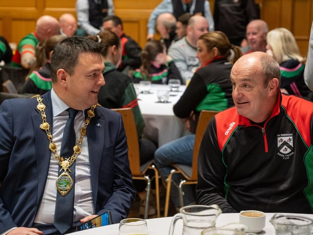 The Mayor Councillor Ruairi McHugh with Paul Simpson who is one of the founding members of Doire Trasna GAC. Picture Martin McKeown. 22.01.26