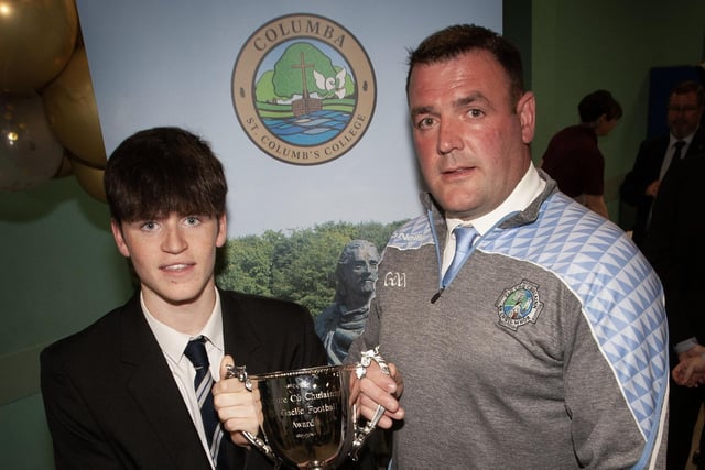 Fergal Cutliffe, winner of the Culmore GAA KS4 Prize being presented his award by Culmore GAA chair, Mr. Dermot McErlean at last week's St. Columb's College Senior Prizegiving