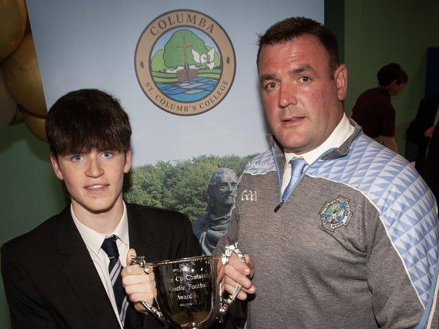 Fergal Cutliffe, winner of the Culmore GAA KS4 Prize being presented his award by Culmore GAA chair, Mr. Dermot McErlean at last week's St. Columb's College Senior Prizegiving