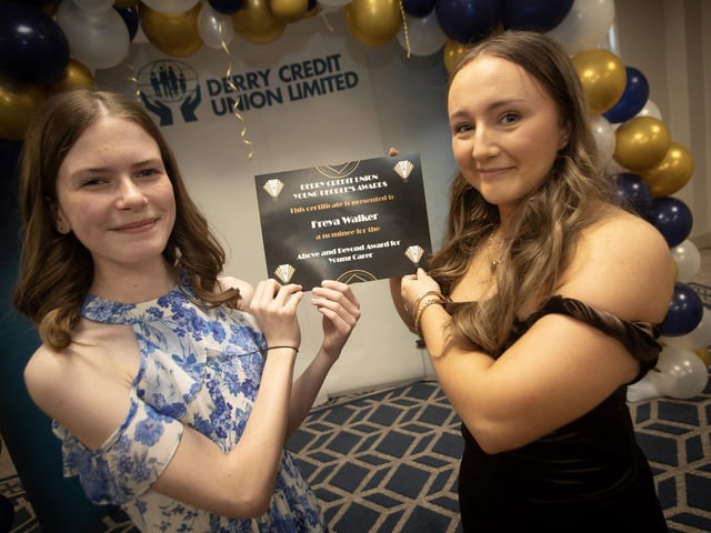 Derry Credit Union's Young People's Awards 2025 nominee Freya Walker being presented with her Above and Beyond Award for Young Carer certificate by Lauren McBrearty, Youth Committee, on Monday night.