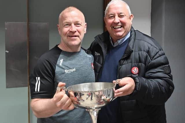 U20 manager Ryan O'Neill and Co. Chairman John Keenan with the Richie McElligott Cup.