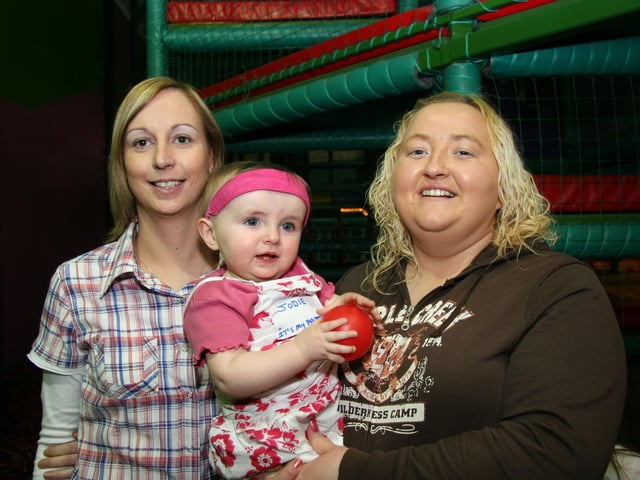 Birthday girl Jodie smiles for the camera with her Godmothers Michelle and Patricia 0026JML : Parties and celebrations April 2006: Jodie Kennedy.