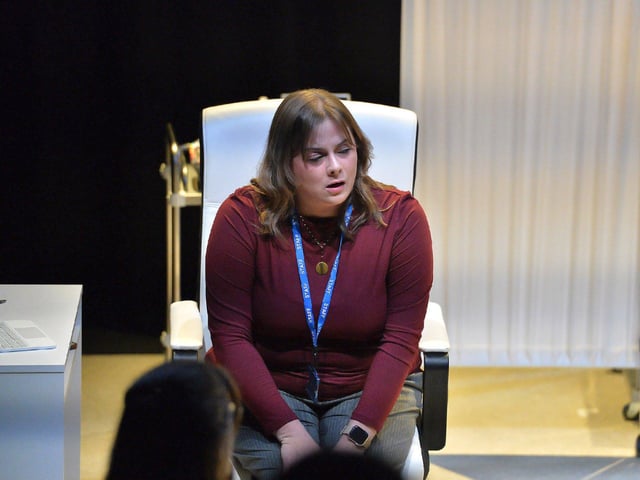 Mortuary make-up artist Jennifer has a conversation with John, who has died by suicide, and appears in a liminal space between life and death in Jonathan Burgess’s play Forever and Ever at New Gate Arts and Culture Centre. Photo: George Sweeney