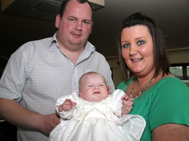 Baby shanice pictured with Godparents, Michael forrest and Mairead Devine 0172JML : Parties and celebrations April 2006: Shanice Devine.
