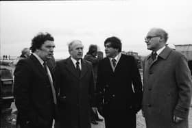 SDLP Leader John Hume with construction firm representatives and dignitaries during a visit by the European Commissioner for European Commissioner for Taxation, Consumer Affairs, Transport and Parliamentary Relations,  and Inter-institutional Relations and Administration, Richard Burke.