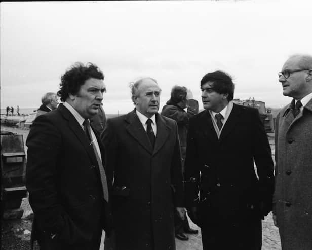SDLP Leader John Hume with construction firm representatives and dignitaries during a visit by the European Commissioner for European Commissioner for Taxation, Consumer Affairs, Transport and Parliamentary Relations,  and Inter-institutional Relations and Administration, Richard Burke.
