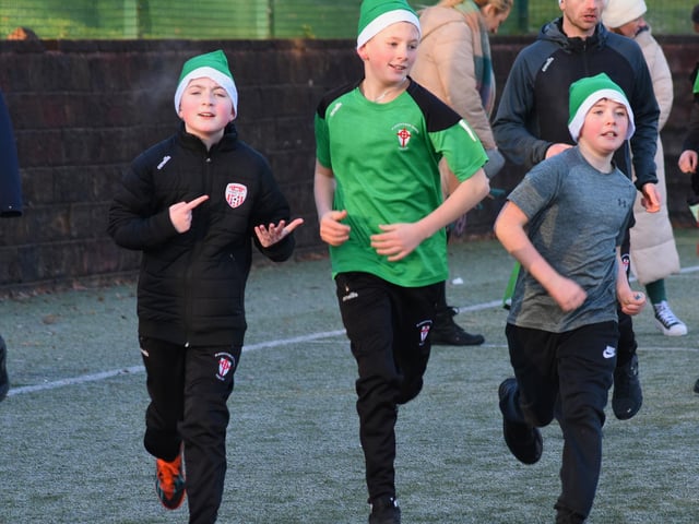 Benjamin, Shane, Ronan, Mr Quigley and Rory all complete Tuesday's Santa's Run.