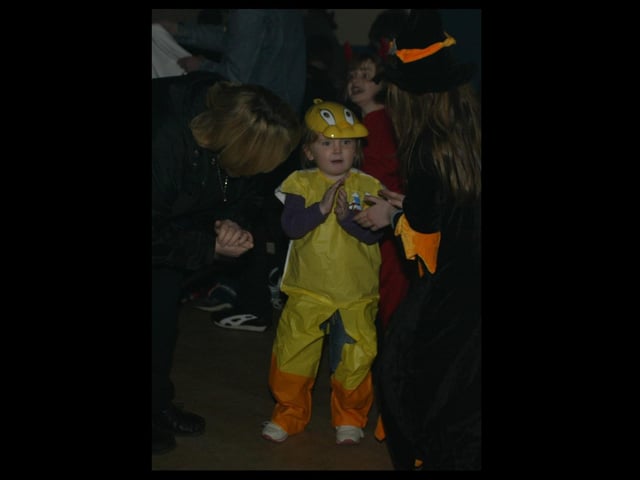 Young people boogying at a Halloween Disco in 2003