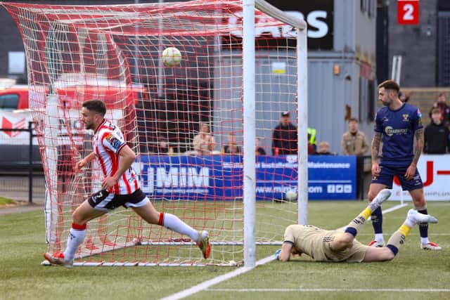 Michael Duffy wheels away to celebrate after finding the back of the net for his sixth goal of the season.