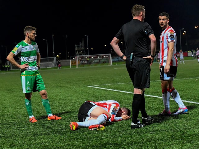 Patrick McEleney wins a penalty for Derry City against Shamrock Rovers defender Josh Honohan. Photograph: George Sweeney