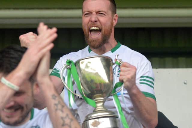Craigbane captain Brain Rainey celebrates their recent Derry Championship victory.