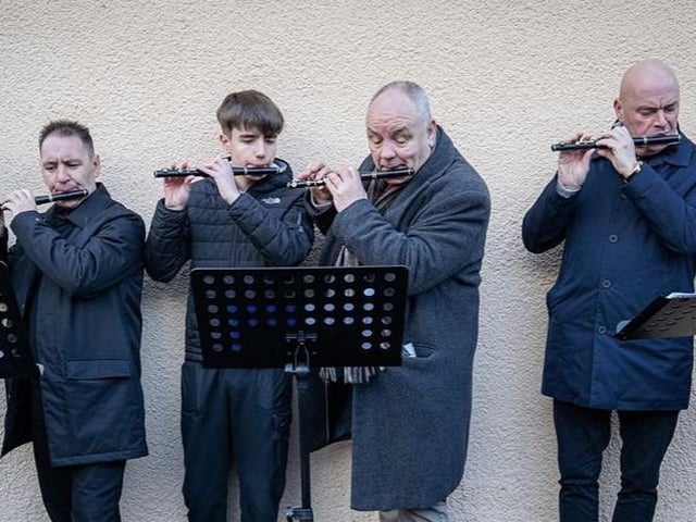 Members of the William King Memorial Flute Band playing at the service on Sunday.