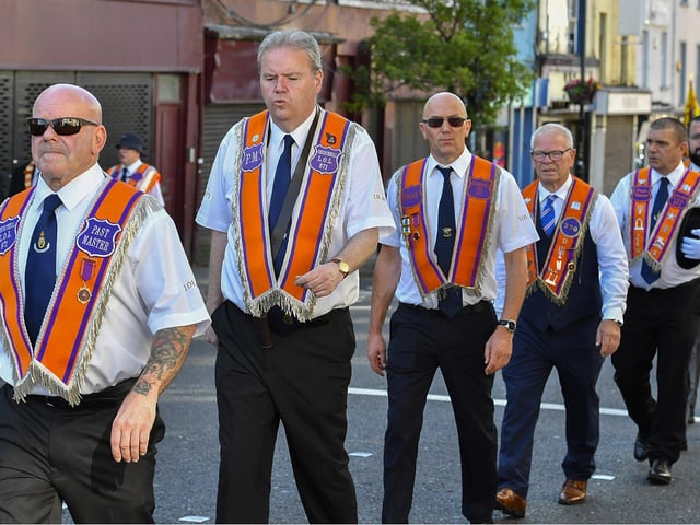 Orangemen take part in the July 12 celebrations in Derry’s city centre on Saturday morning. Photo: George Sweeney