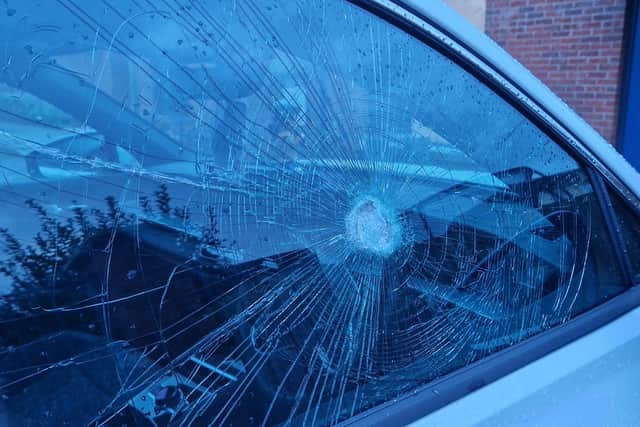 Smashed car window.