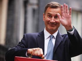 LONDON, ENGLAND - MARCH 15: UK Chancellor Jeremy Hunt leaves Downing Street with the despatch box to present his spring budget to parliament on March 15, 2023 in London, England. Highlights of the 2023 budget are an increase in the tax-free allowance for pensions which the Chancellor hopes will stem the number of people taking retirement, a package of help for swimming pools affected by the increase in energy bills and changes to childcare support for parents on universal credit. (Photo by Dan Kitwood/Getty Images)
