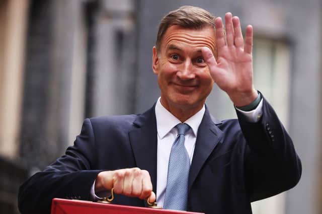 LONDON, ENGLAND - MARCH 15: UK Chancellor Jeremy Hunt leaves Downing Street with the despatch box to present his spring budget to parliament on March 15, 2023 in London, England. Highlights of the 2023 budget are an increase in the tax-free allowance for pensions which the Chancellor hopes will stem the number of people taking retirement, a package of help for swimming pools affected by the increase in energy bills and changes to childcare support for parents on universal credit. (Photo by Dan Kitwood/Getty Images)