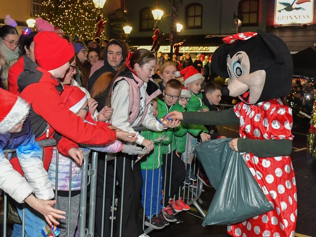 Santa arrived in Buncrana on Friday evening to meet the children and toswitch on the Christmas tree lights switch in Market Square. Photo: George Sweeney