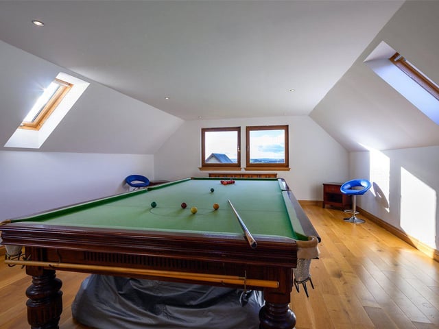 Games room above garage.