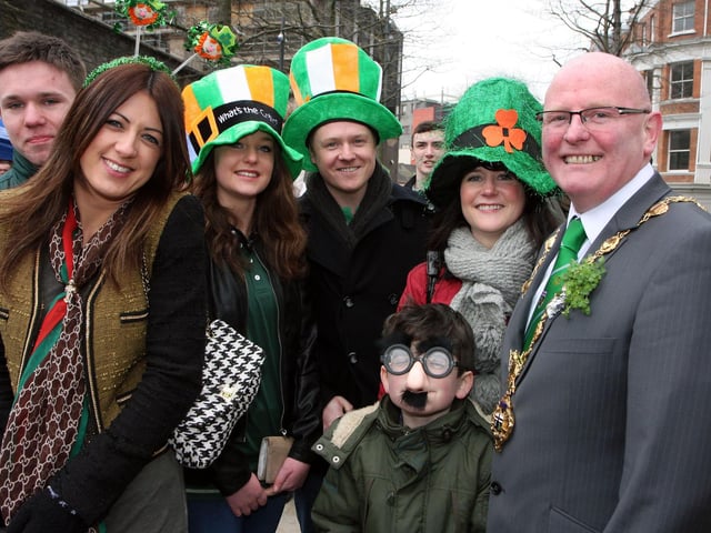 The Mayor of Derry Councillor Kevin Campbell,  with the Heaney family  and friends from Derry, on his tour of Guildhall Square during the St. Patrick’s Day celebrations on Sunday.