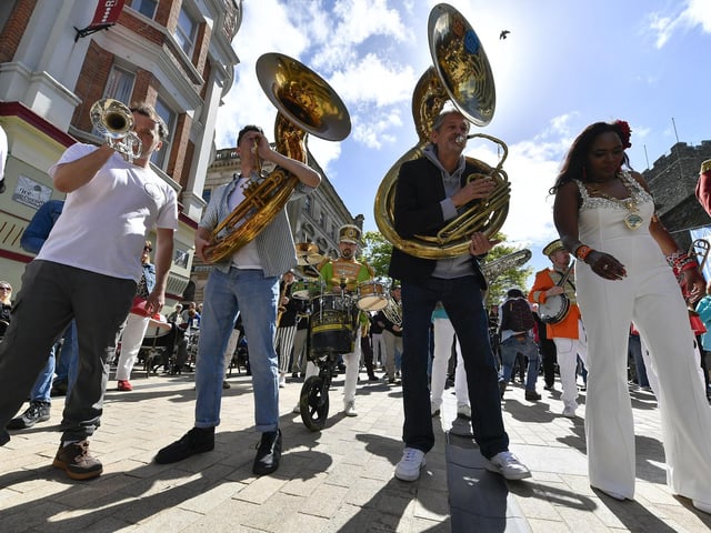 Mayor Lilian Seenoi Barr with jazz musicians in Waterloo Place Saturday afternoon. Photo: George Sweeney