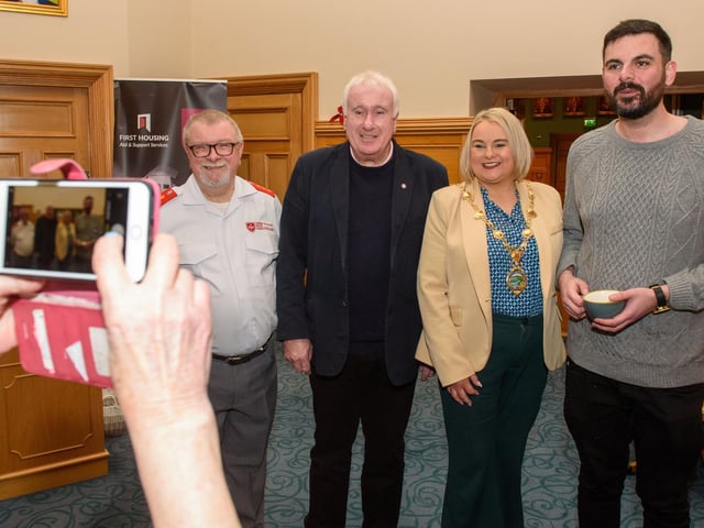 The Mayor Councillor Sandra Duffy welcomed members of the Order of Malta to the Guildhall where she presented the organisation with commemorative crystal in recognition of their contribution across the Derry City and Strabane District Council area. Included are Charlie Glenn, Noel McLoone and Jude Morrow who recentky published a book on the organisations work during the Troubles.  Picture Martin McKeown. 06.02.23:Mayor of Derry City and Strabane District Council’s reception for Knights of Malta in the Mayor’s Parlour, Guildhall on Monday 6th February.