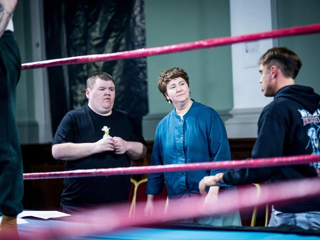 Having a ringside chat ahead of the action.
