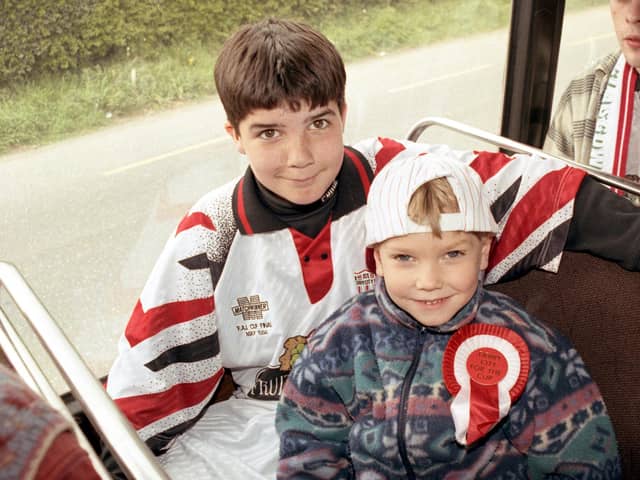 Brendan Deane and his nephew making their way to the FAI Cup Final in 1994 against Shelbourne. Photos by Hugh Gallagher