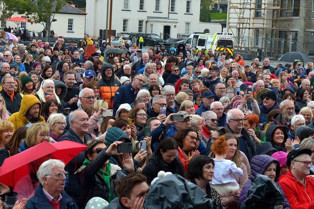 Some of the large attendance at Ebrington Square for Phil Coulter’s  live performance of his iconic hit ‘The Town I Loved So Wel'  on Saturday afternoon last. Photo: George Sweeney.  DER2240GS – 19