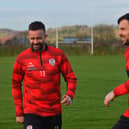 Derry City players Robbie Benson and Pat Hoban training at the GAA Centre of Excellence, Owenbeg, on Monday morning.  Photograph: George Sweeney