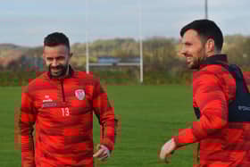 Derry City players Robbie Benson and Pat Hoban training at the GAA Centre of Excellence, Owenbeg, on Monday morning.  Photograph: George Sweeney