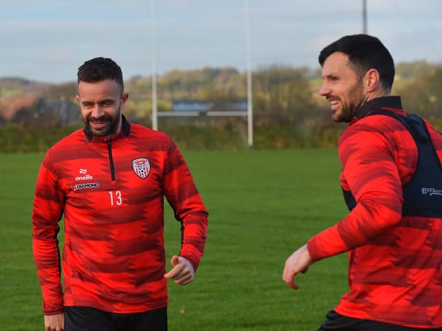 Derry City players Robbie Benson and Pat Hoban training at the GAA Centre of Excellence, Owenbeg, on Monday morning.  Photograph: George Sweeney