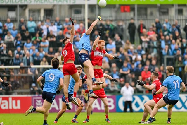 Peadar Ó Cofaigh Byrne of Dublin in action against Dan Higgins and Conor Glass during the GAA Football All-Ireland Senior Championship Round 3 match. Photo by Ramsey Cardy/Sportsfile