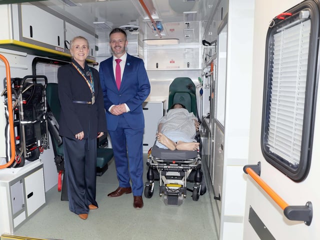Dr Andrea Shepherd, Deputy Head of School of Nursing and Paramedic Science at Ulster University, and Health Minister Robbie Butler MLA observing the simulated ambulance Derry campus as part of the specialist facilities nursing and paramedic students use in their training.