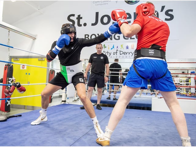 LOOKING SHARP! Connor Coyle keeps his range as he prepares a young St Joseph's boxer for action in the William Wallace Box Cup.