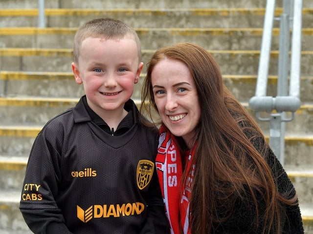 Smiling Derry City fans at the Brandywell for the game against UCD on Friday evening last. Photo: George Sweeney.  DER2320GS – 115