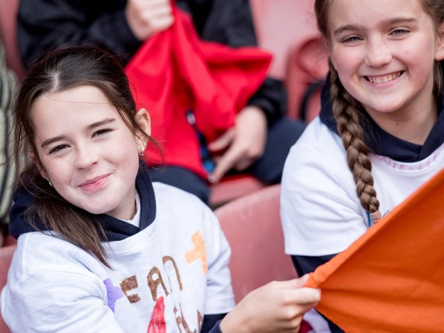 Participants at the Derry Diocese Fan The Flame annual Mass 2025 in Celtic Park.