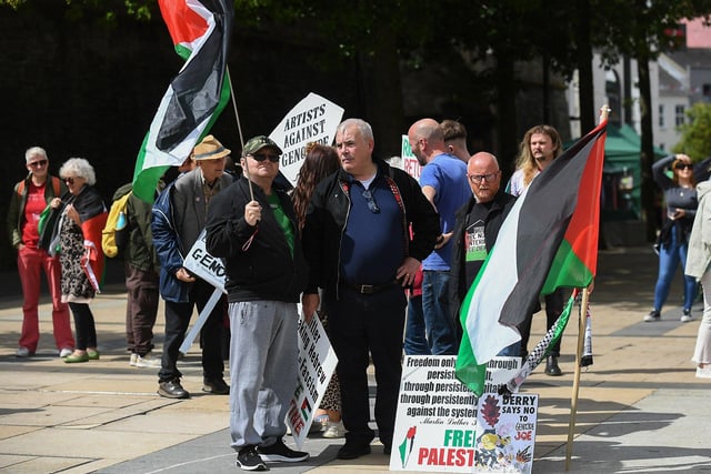 People gather at a rally in Guildhall Square, organised by the Derry Branch of Ireland Palestine Solidarity Campaign to mark 300 days of Genocide in Gaza. Photo: George Sweeney