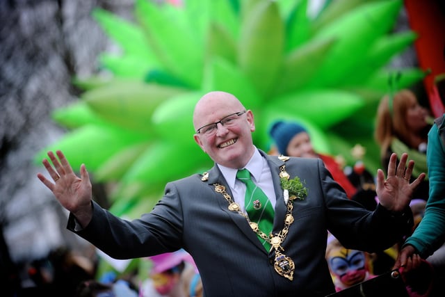 The Mayor of Derry, Councillor Kevin Campbell leads the St Patrick's Day parade through Derry CIty Centre. (1803SL44) Photo: Stephen Latimer