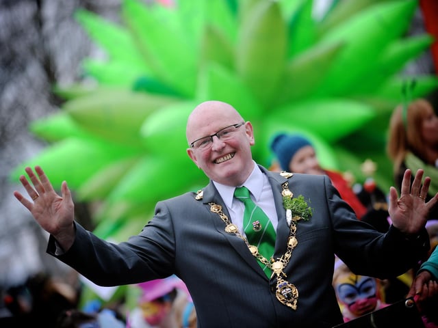 The Mayor of Derry, Councillor Kevin Campbell leads the St Patrick's Day parade through Derry CIty Centre. (1803SL44) Photo: Stephen Latimer