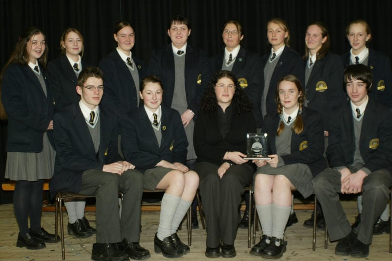 Young Enterprise Award receipients "Fashion Police" pictured receiving their award from Miss Scullion at the Lumen Chrisit College Senior Prizegiving. (1001JB25)