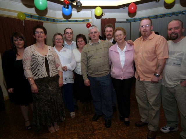 Amanda, Patricia, Margaret, Ciaran, Christine, birthday boy Michael, Vic, great-aunt Mary, Christopher and Kevin 0027/JML : Parties and celebrations January 2006: Michael Rankin.