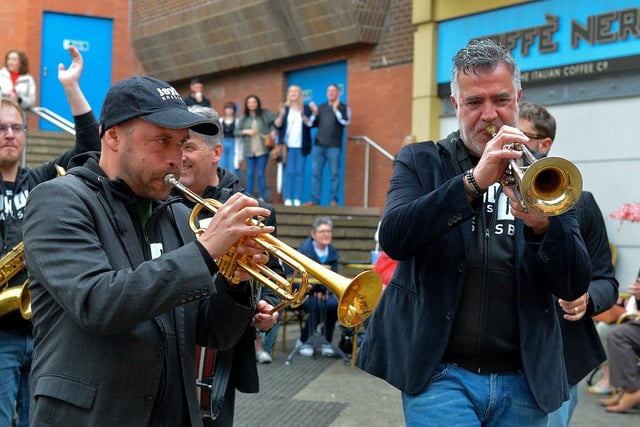 The Jaydee Brass Band’s Dann Bogers, on the left, and Harbraken Joep performing at the Richmond Centre Steps during Derry’s Jazz Festival Weekend. Photo: George Sweeney. DER2318GS – 11