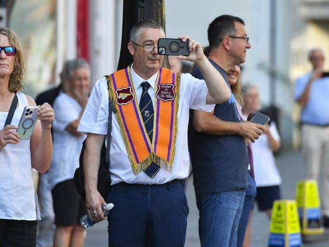 Capturing the July 12 celebrations in Derry’s city centre on Saturday morning. Photo: George Sweeney