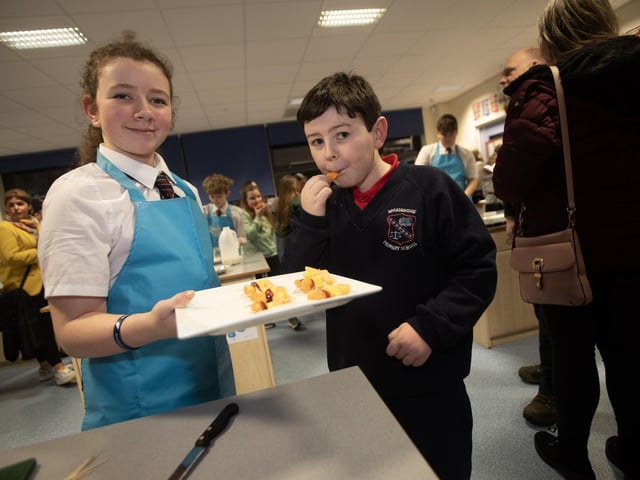 Broadbridge PS pupil Daniel Nash sampling some of the fruit on offer during Open Day at Oakgrove. (Photos: Jim McCafferty Photography)