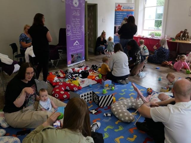 Parents and children making good use of the activities and services on offer at the North West BAPS event.