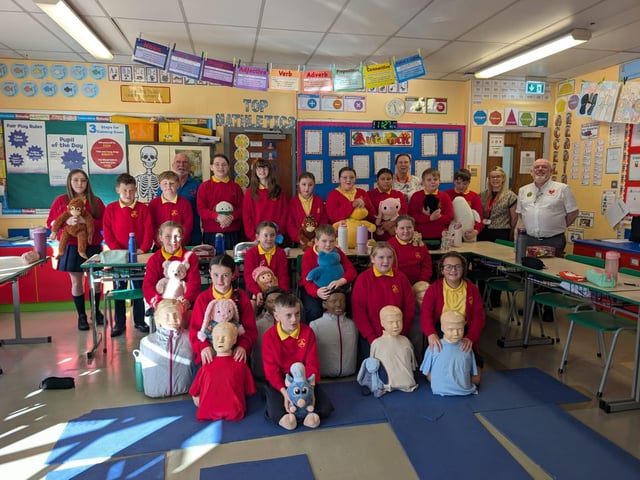 Children from Steelstown Primary School with Heart of Foyle volunteers on Restart a Heart Day.
